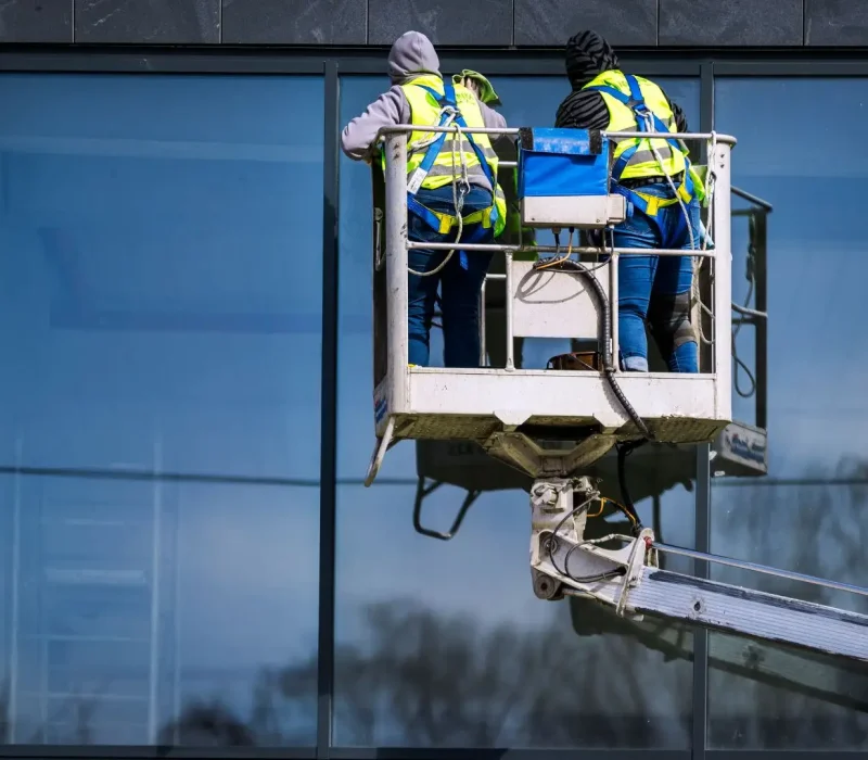 Men Cleaning Skyscraper Windows